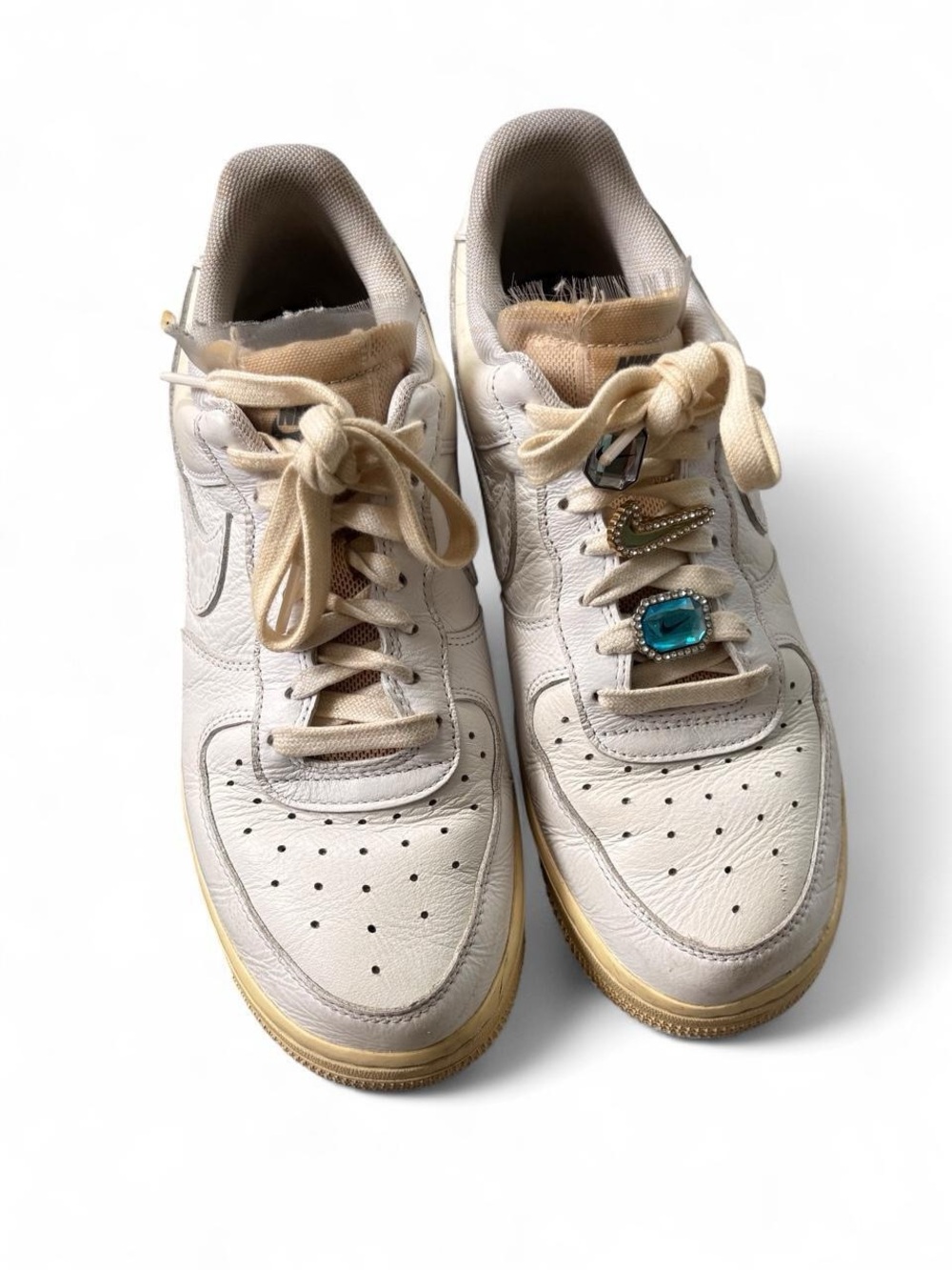 Nike Women's Off-White Leather Sneakers with Gold Trim and Teal Accent
